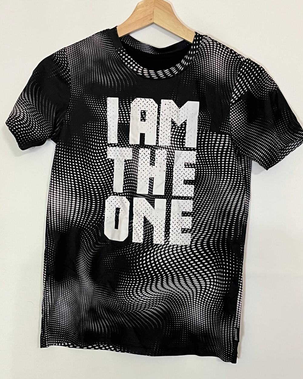 Spalding I AM THE ONE polyester child's T-shirt. Size medium.